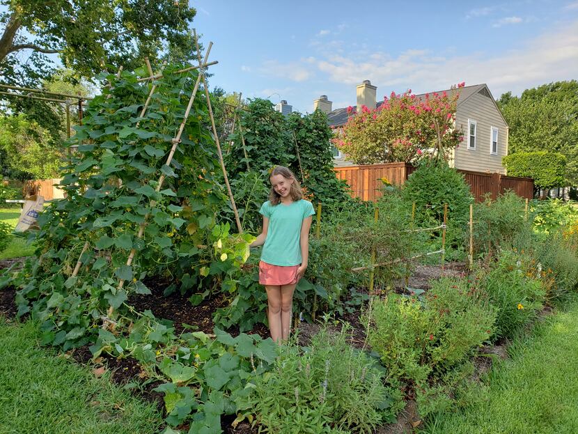 Casey Marsh enjoys her family’s garden in Grapevine.