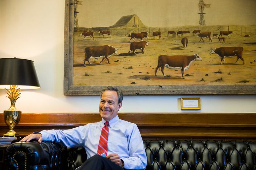 Speaker of the House Joe Straus smiles in his office on the third day of a special...