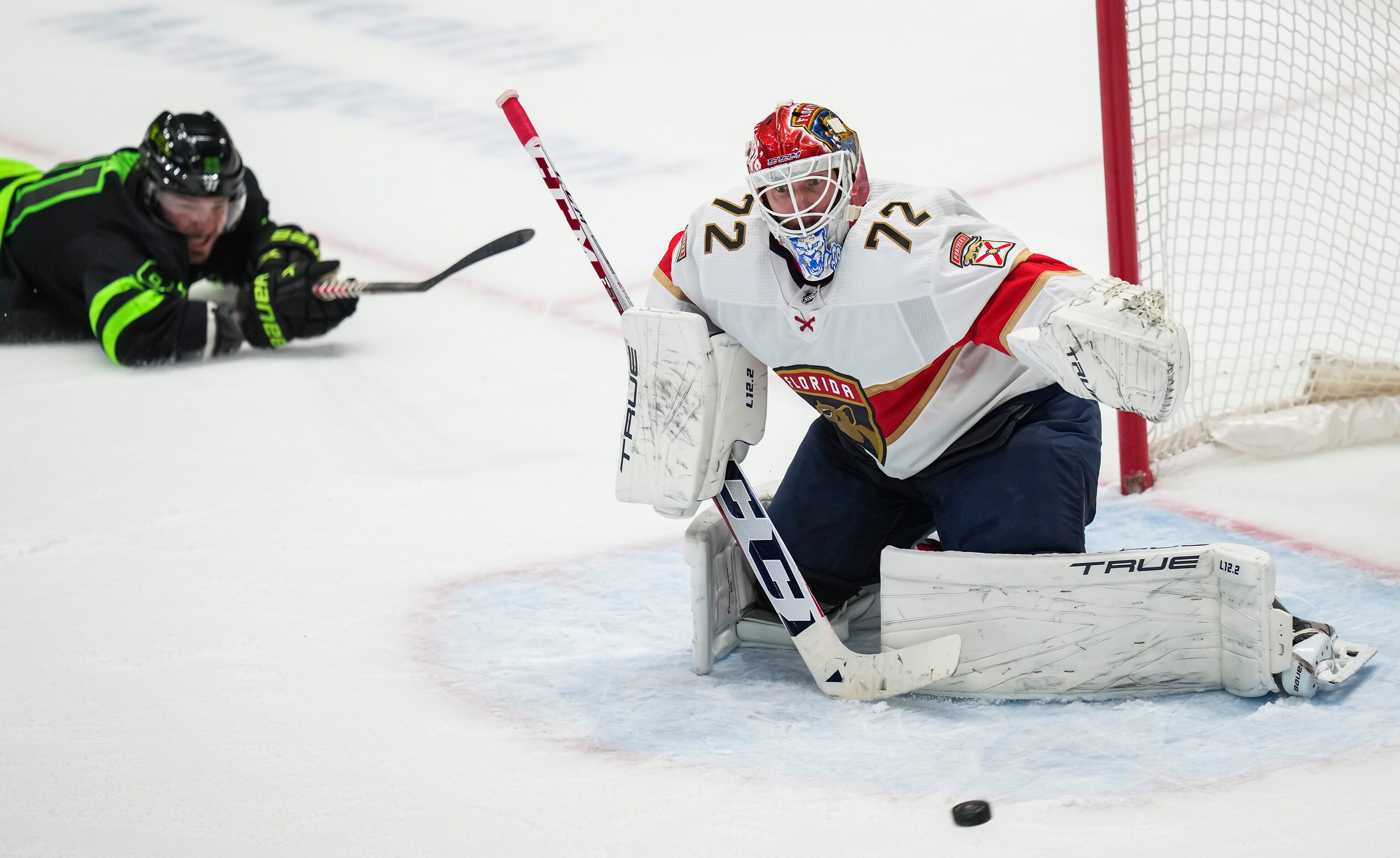 Florida Panthers goaltender Sergei Bobrovsky (72) watches a shot sail past the net as Dallas...