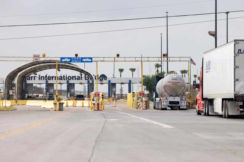 Trucks heads south toward the recently reopened Pharr–Reynosa International Bridge on S....