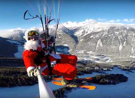 Santa takes flight on Rollercoaster Run, paragliding down into British Columbia's Panorama...