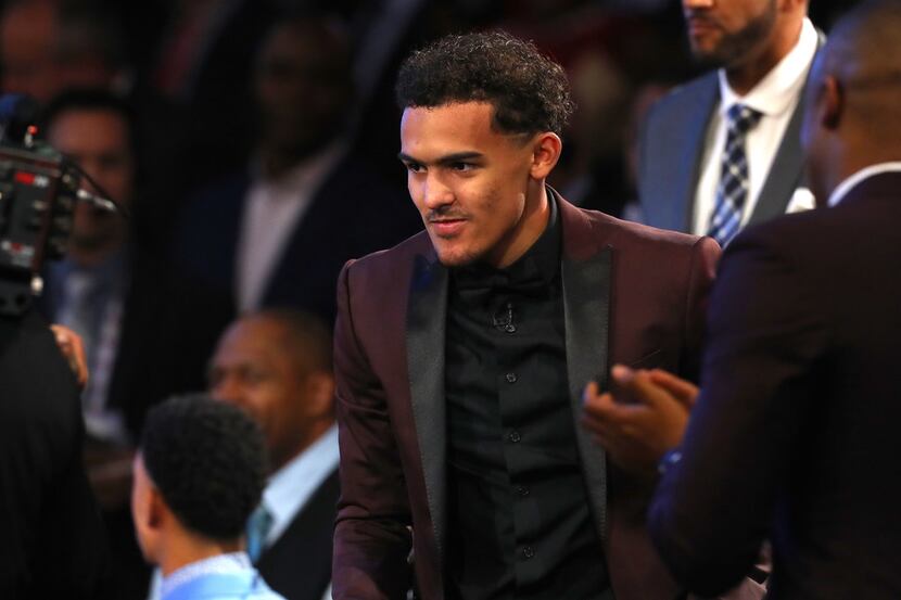 NEW YORK, NY - JUNE 21:  Trae Young reacts after being drafted fifth overall by the Dallas...