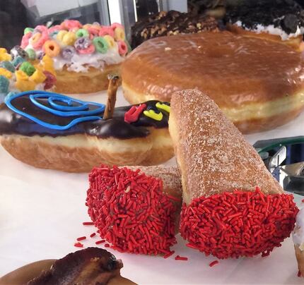 Colorful sugary creations entice doughnut lovers 24-hours a day at Voodoo Doughnut, Portland. 