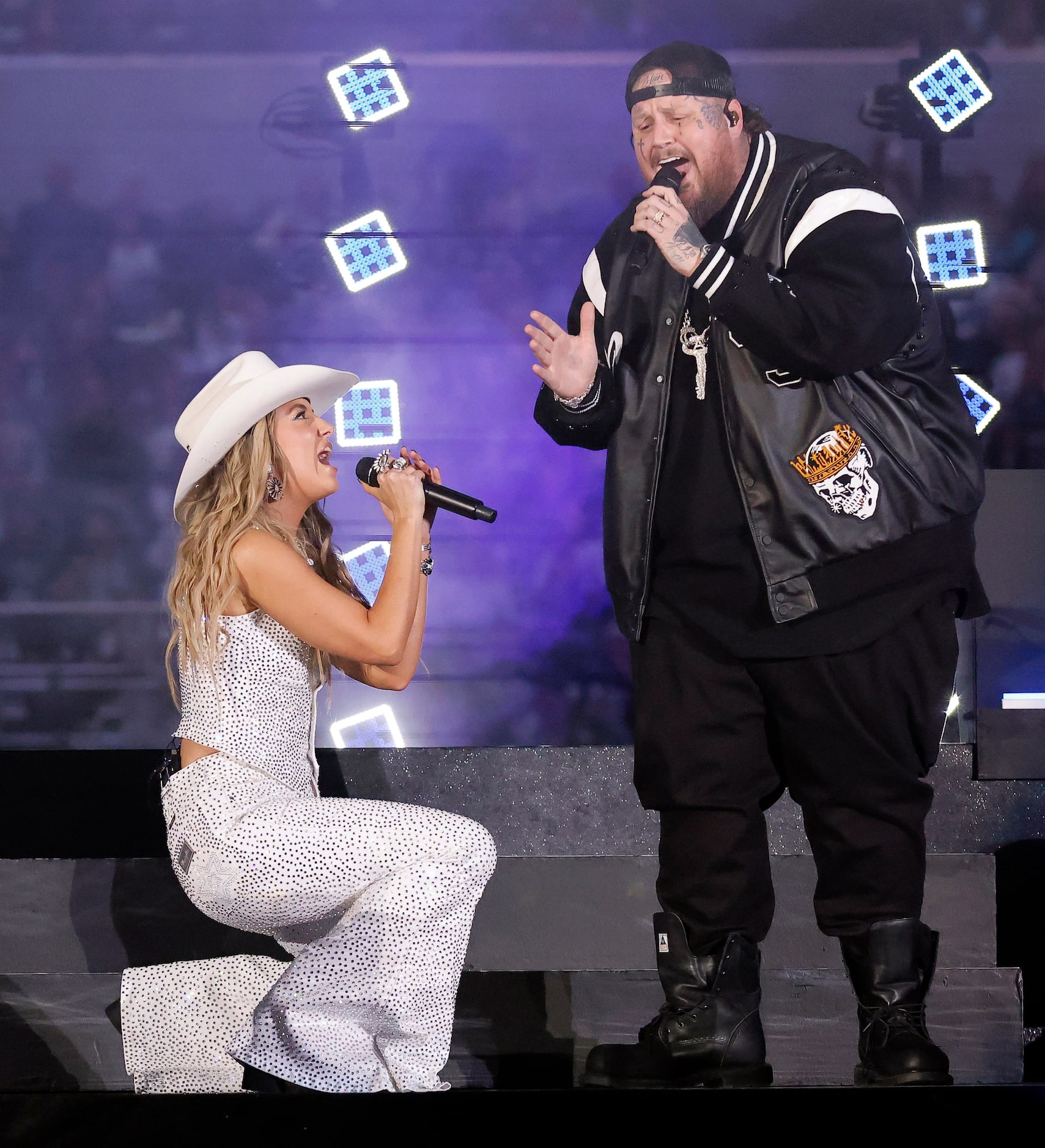 Country artist Lainey Wilson and Jelly Roll perform during the Salvation Army's Red Kettle...