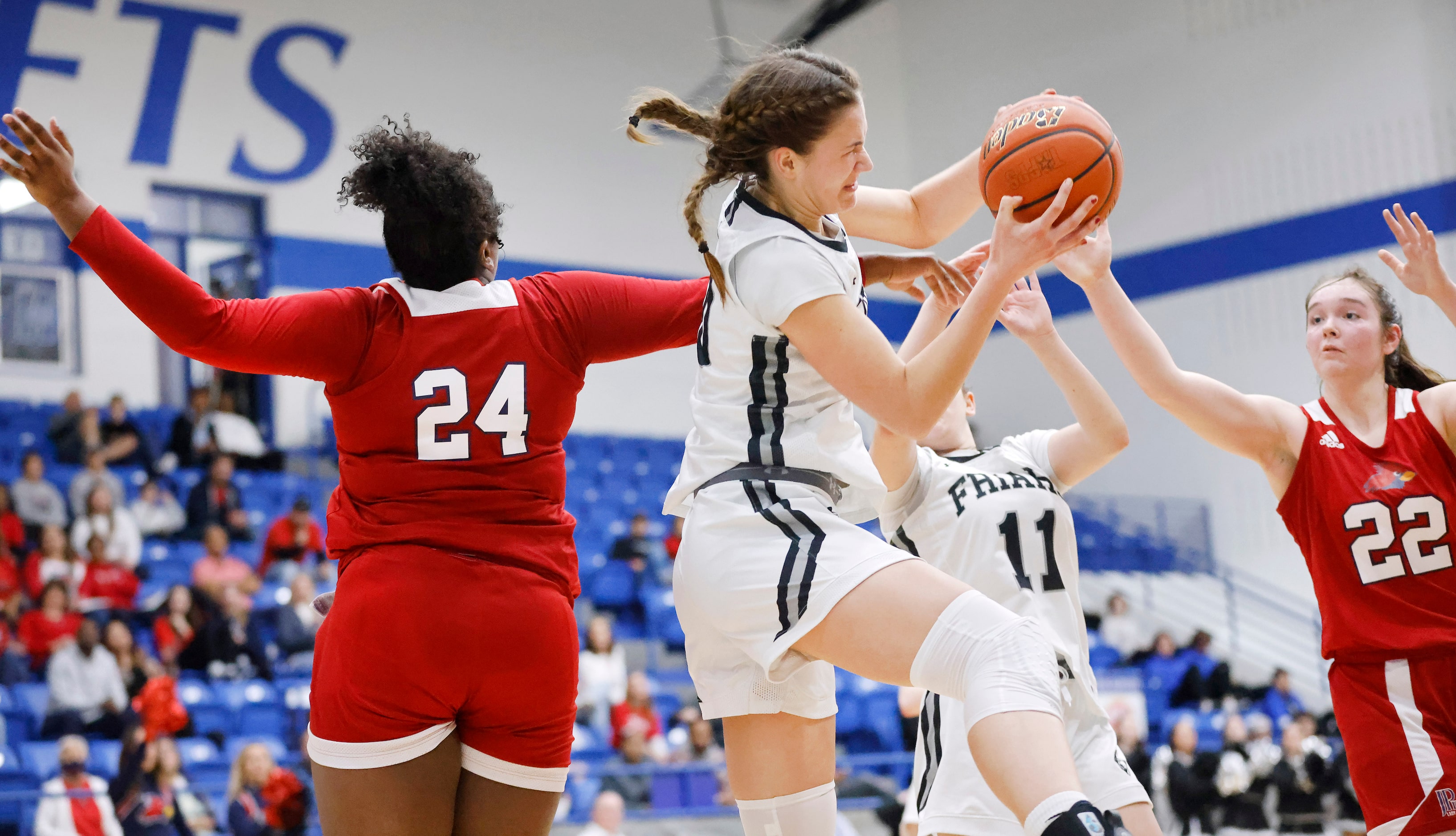 Bishop Lynch forward Ellery Sample (30) comes down with a defensive rebound against John...