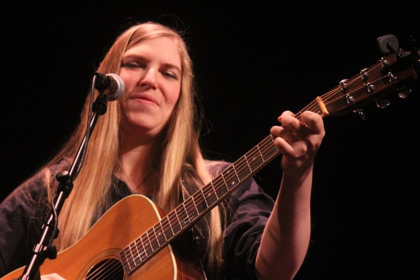 Singer-songwriter Kipyn Martin, performing at Uncle Calvin's Coffeehouse in Dallas on April...