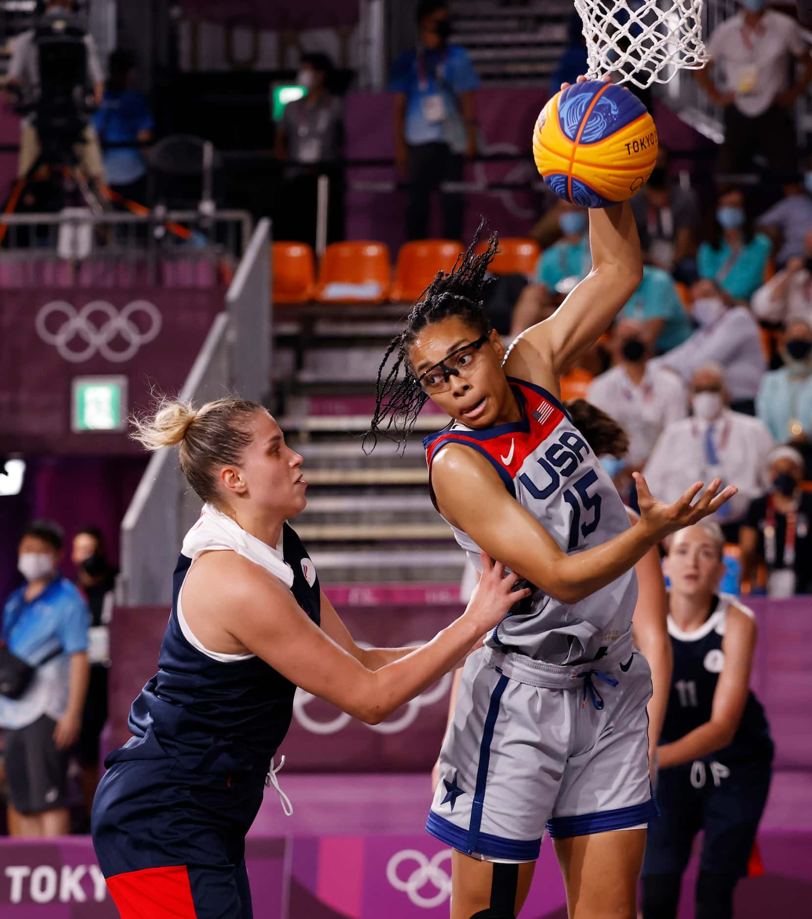 USA’s Allisha Gray (15) grabs a rebound in front of ROC’s Evgeniia Frolkina (16) during the...