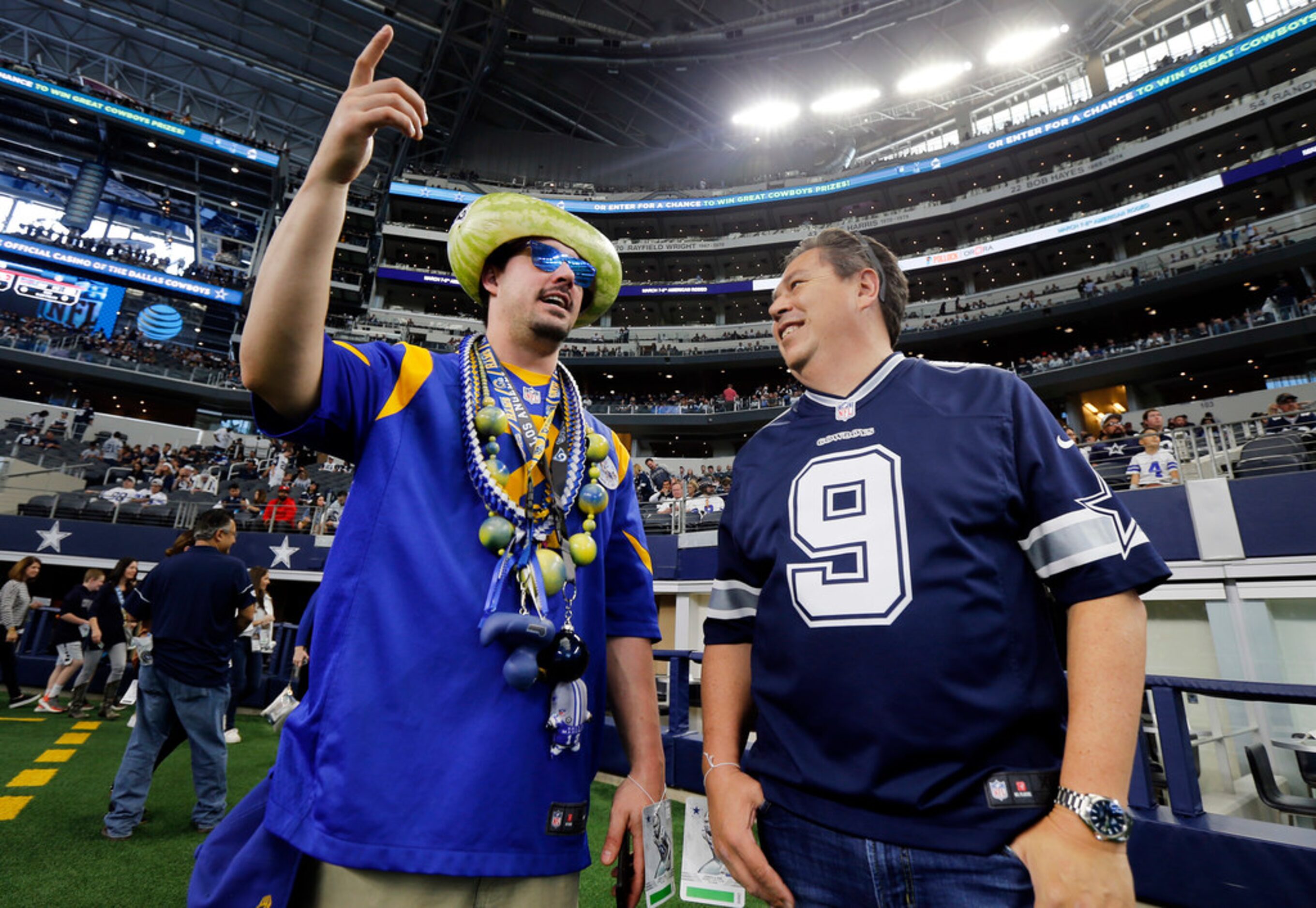 Los Angeles Rams fan Max "Melon" Stanley of Los Angeles (left) and Dallas Cowboys fan Adrian...