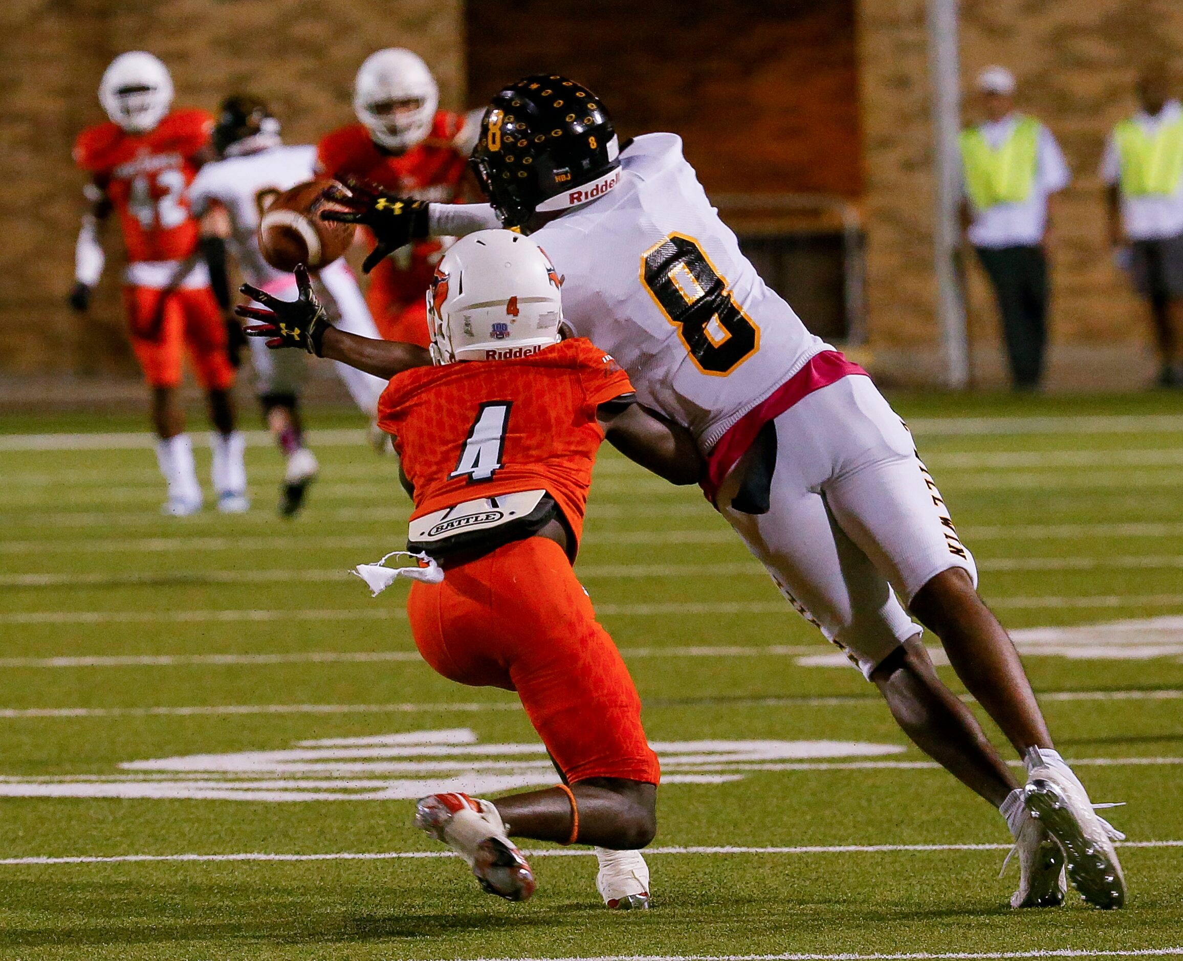 Garland’s wide receiver Ellis Rogers catches a pass over Sachse’s DB Kevin Courtney during...