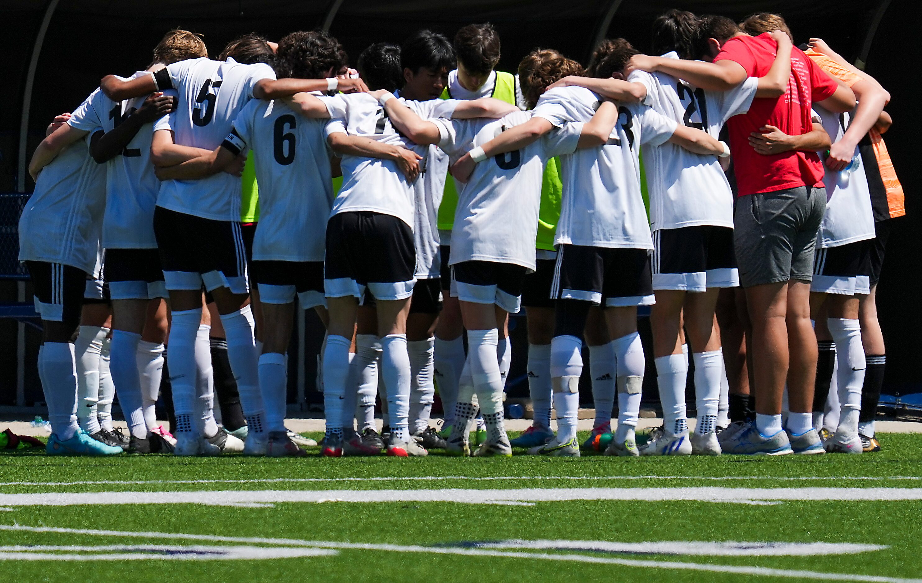 Lake Highlands players huddle before the start of overtime during the Class 6A Region I boys...