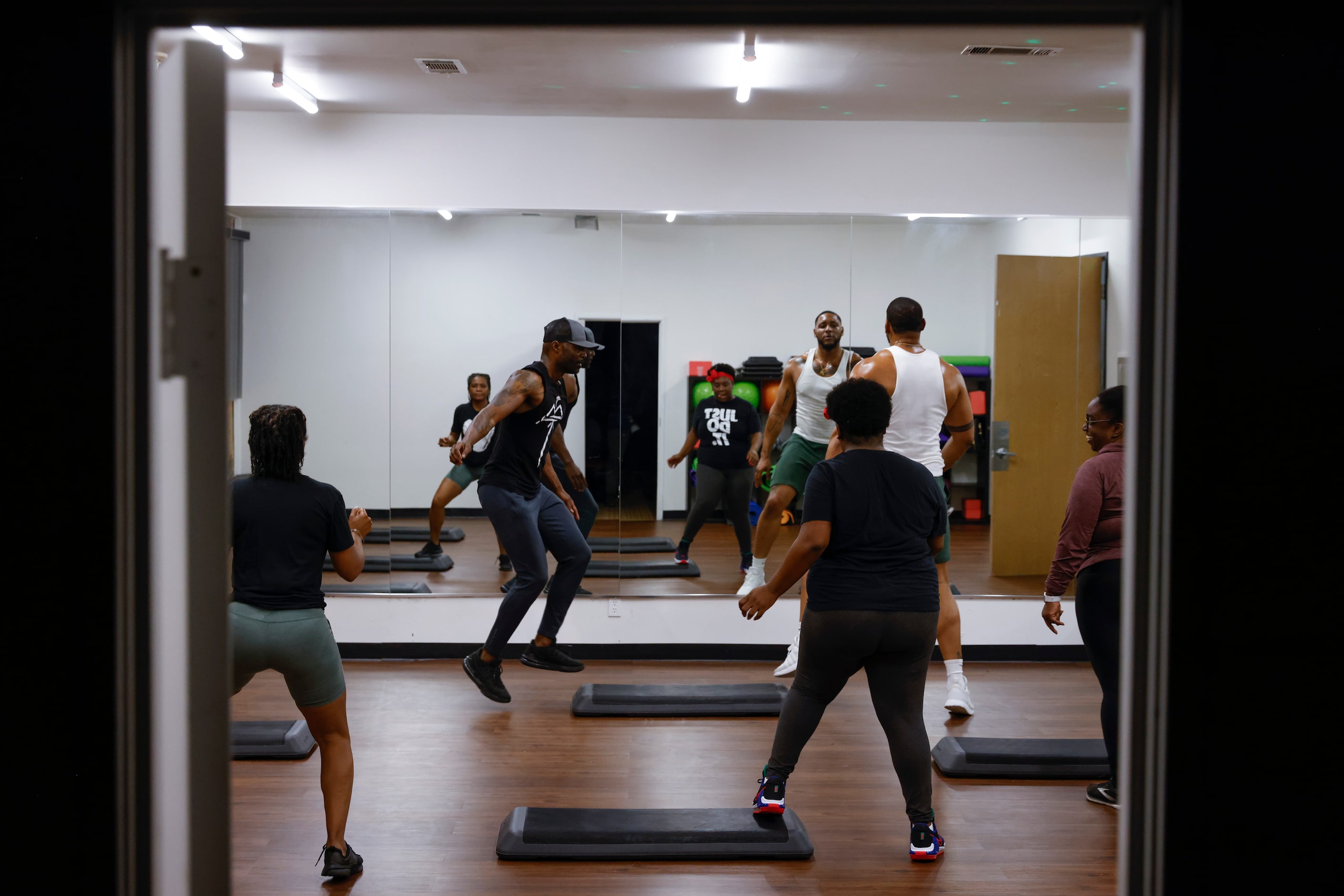 Fredrick Robinson, left, of Grand Prairie leads a Steppin and Reppin session at Abounding...