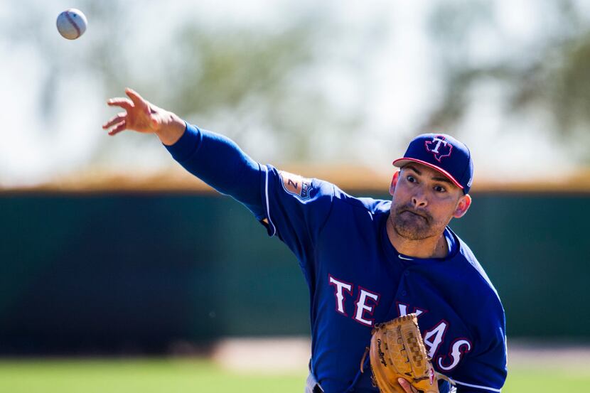 Texas Rangers starting pitcher Eddie Gamboa (78) pitches live batting practice during a...