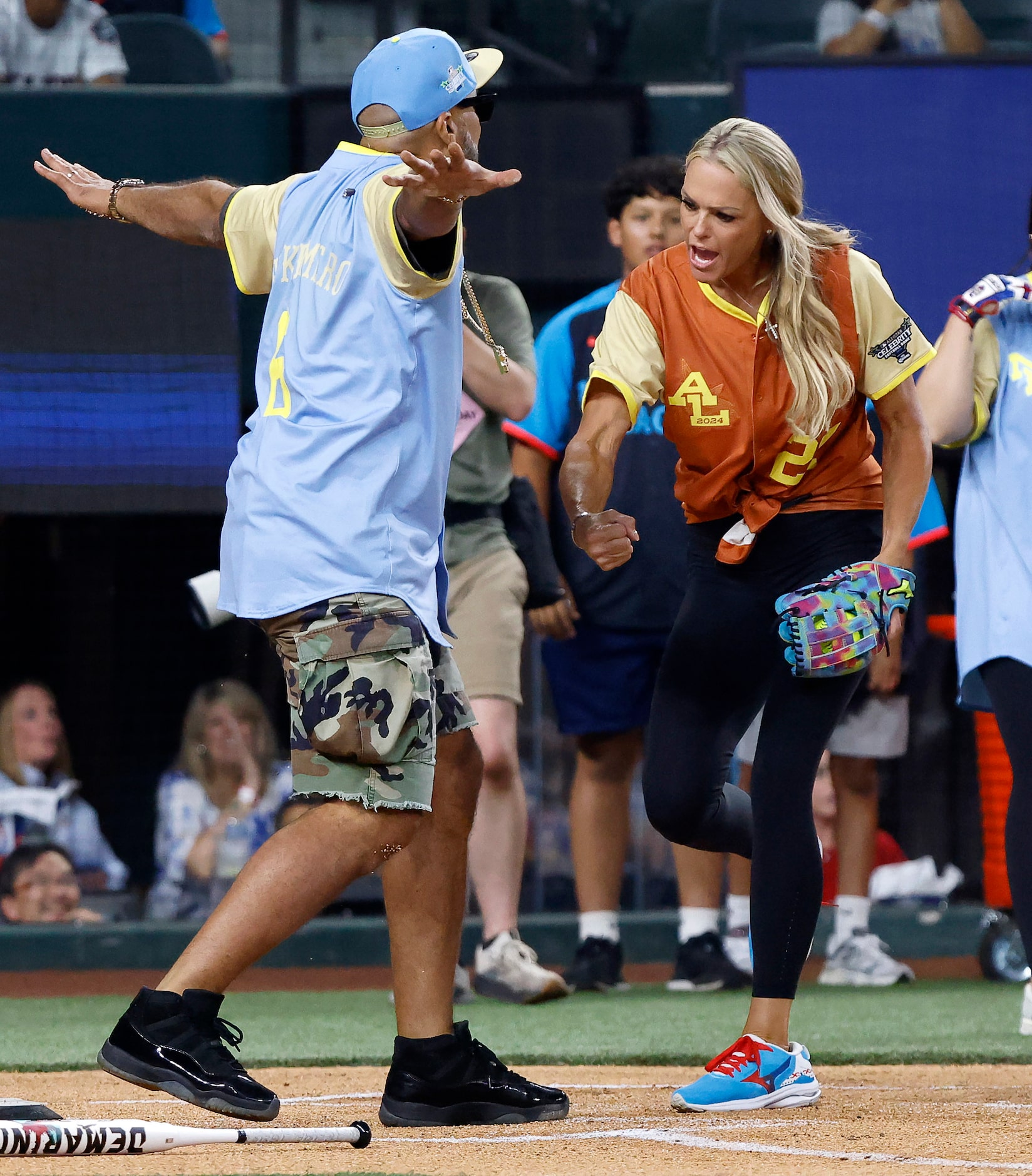 American League catcher Jennie Finch calls out after she tagged National League’s The Kid...