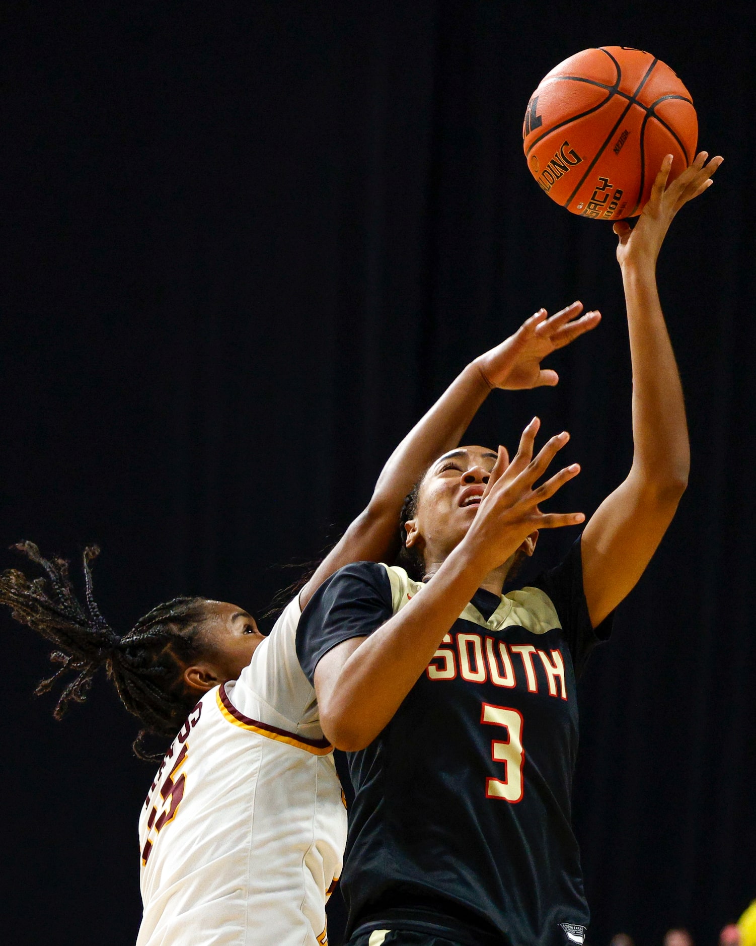 Humble Summer Creek guard Janiya Murphy (15) contests a shot attempt from South Grand...