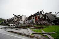 A storm damaged building is seen along Blackburn Lane, Thursday in Columbia, Tenn. Severe...