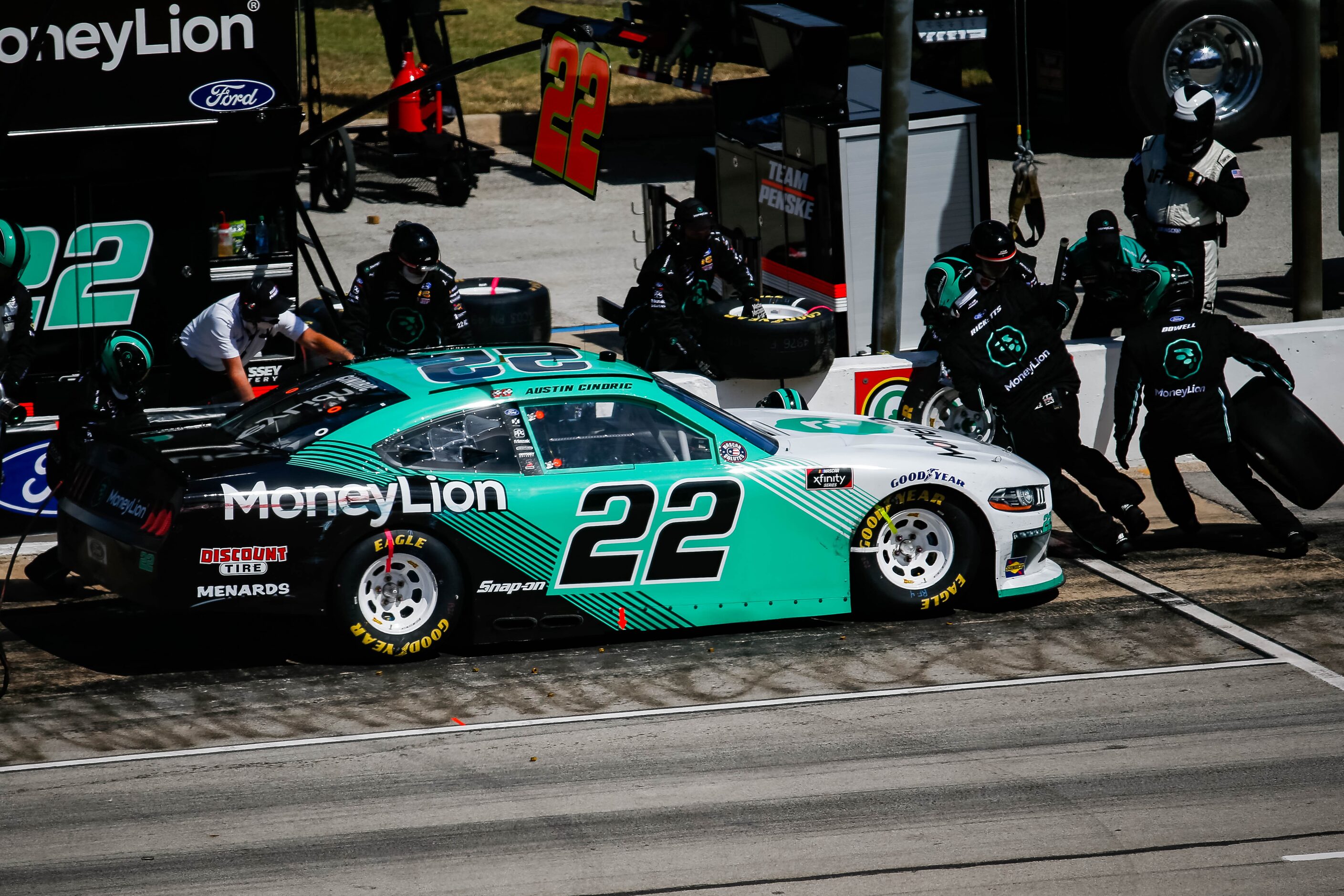 NASCAR Xfinity's Austin Cindric (No. 22) stops with his pit crew during the My Bariatric...