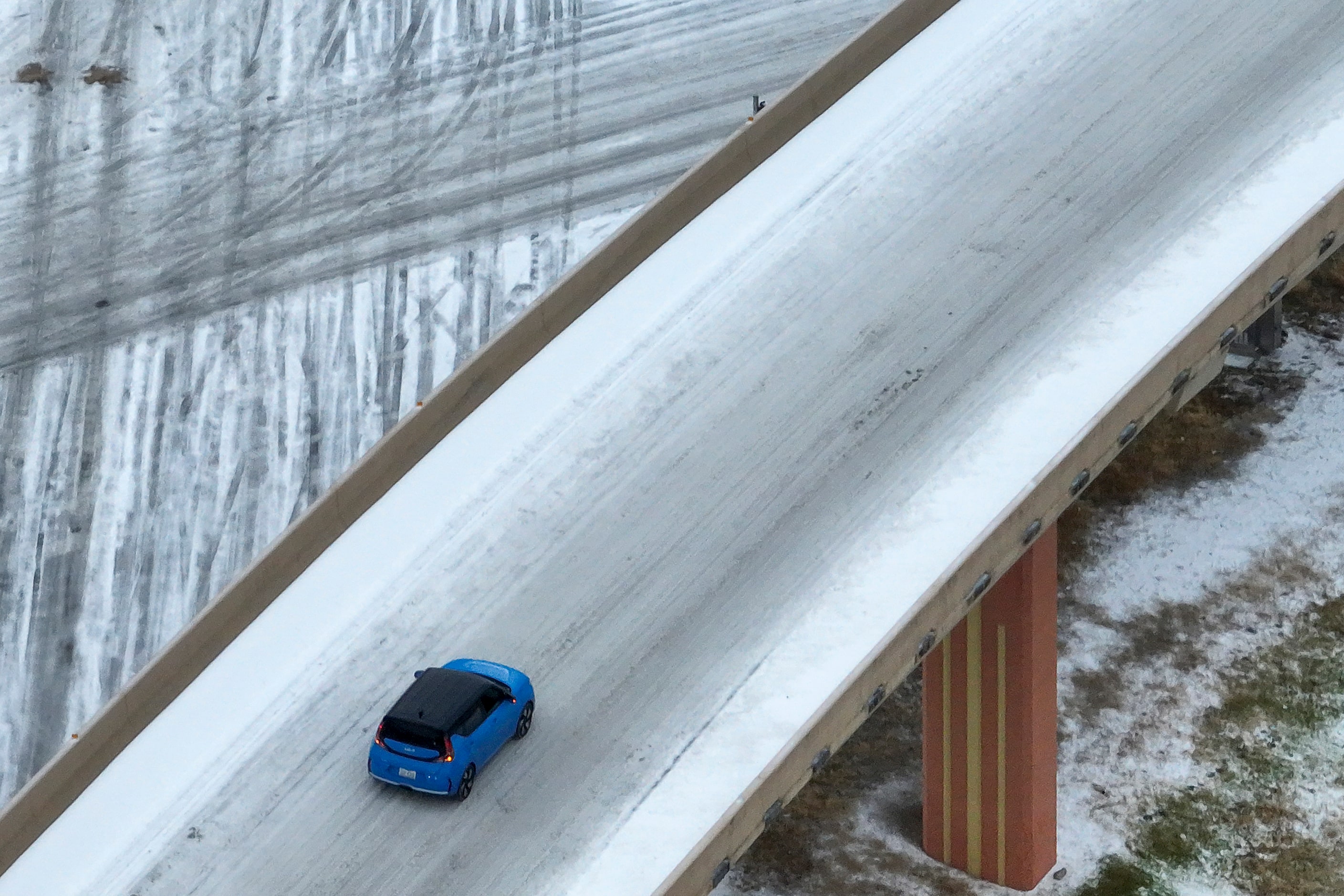 An icy mix covers the High Five Interchange at US 75 and I-635 on Tuesday, Jan. 31, 2023, at...