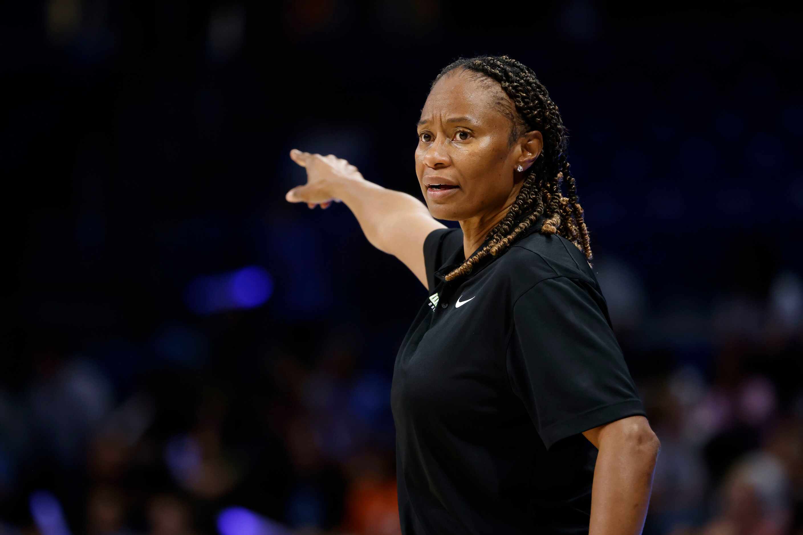 Dallas Wings head coach Vickie Johnson directs her team as they played the New York Liberty...