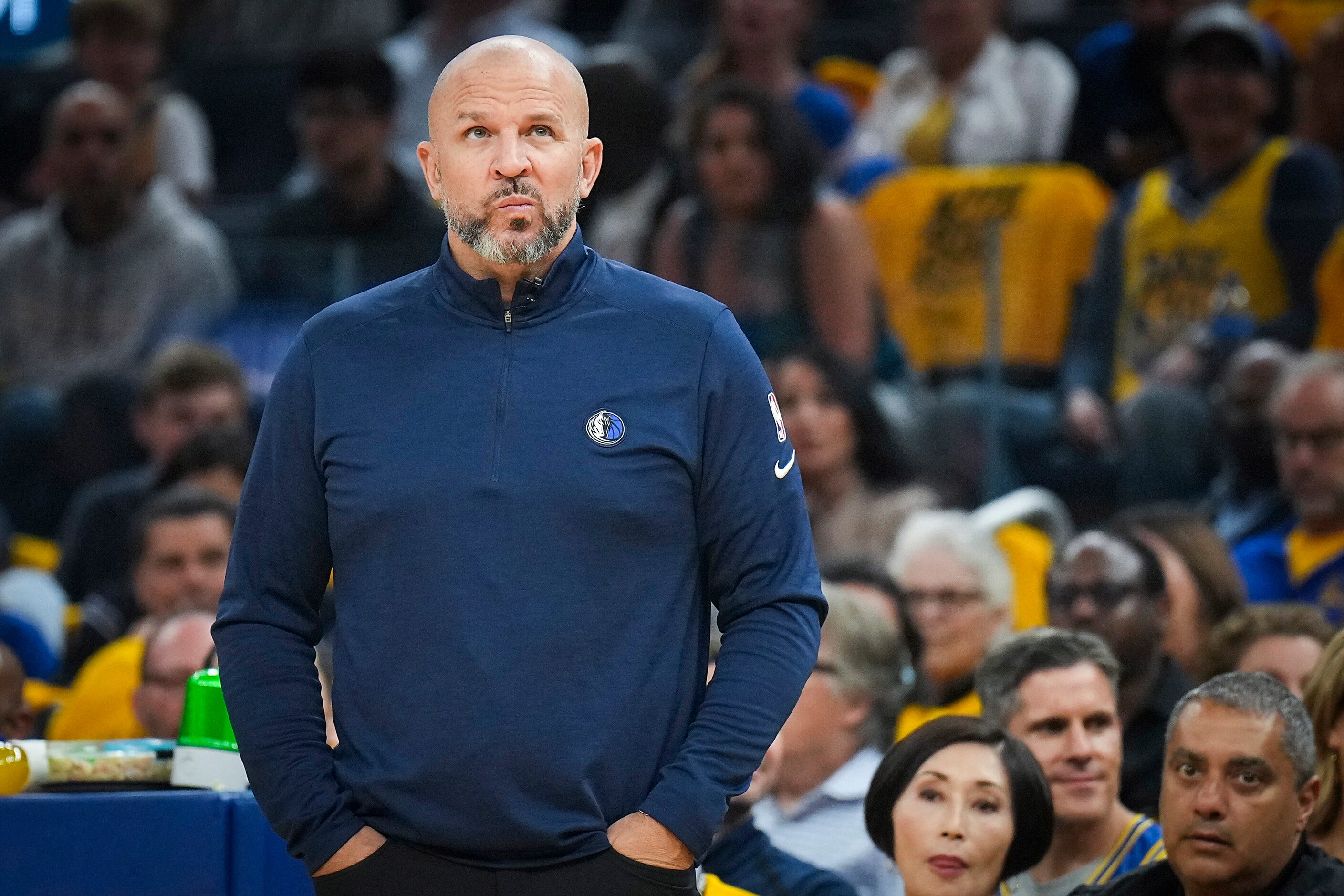 Dallas Mavericks head coach Jason Kidd () watches from the bench during the first quarter in...