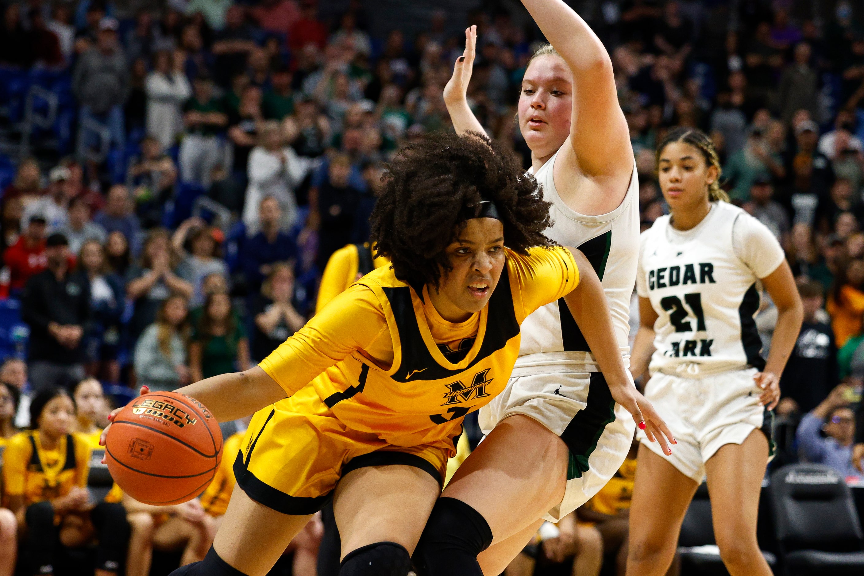 Frisco Memorial guard Brynn Lusby (0) drives past Cedar Park forward Shelby Hayes (44)...