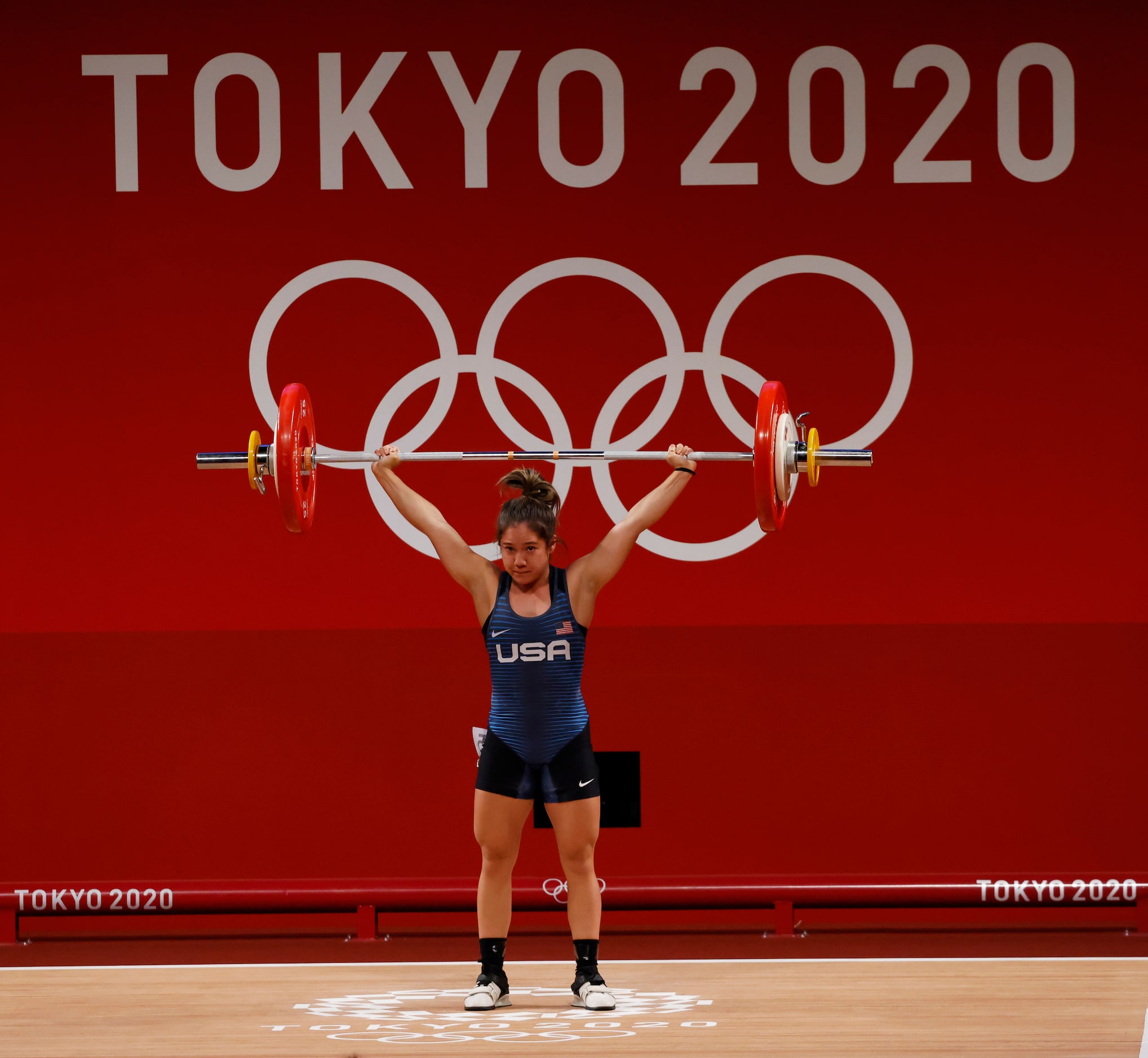 USA’s Jourdan Delacruz competes in the second attempt of the snatch round lifting 86 kg...