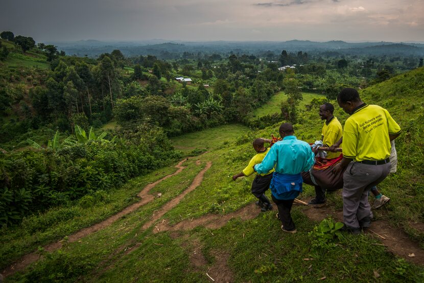 As part of the Saving Mothers, Giving Life initiative in Uganda, villagers respond to help a...