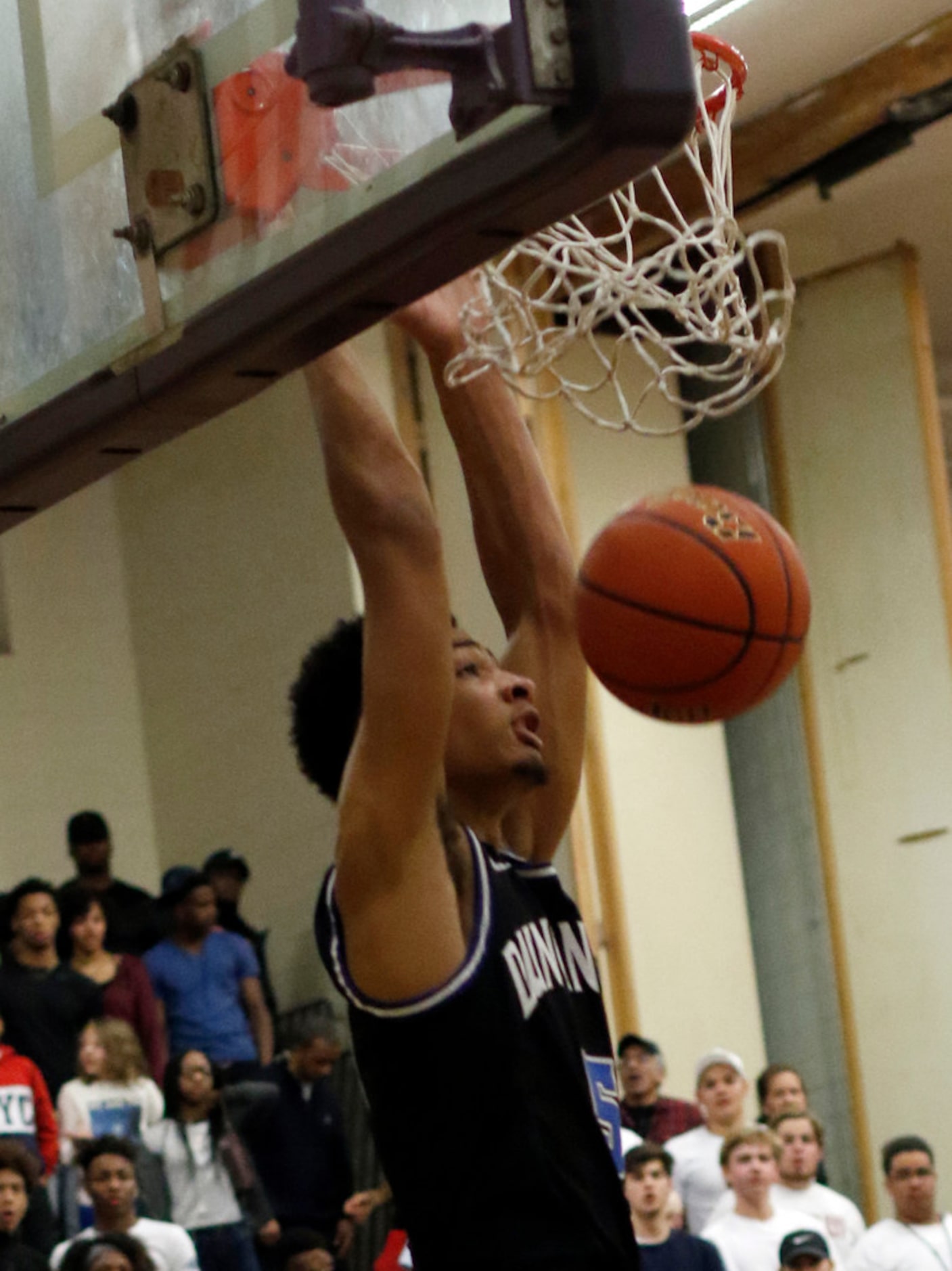 Duncanville's Micah Peavy (5) dunks during first half action against Richardson. The two...