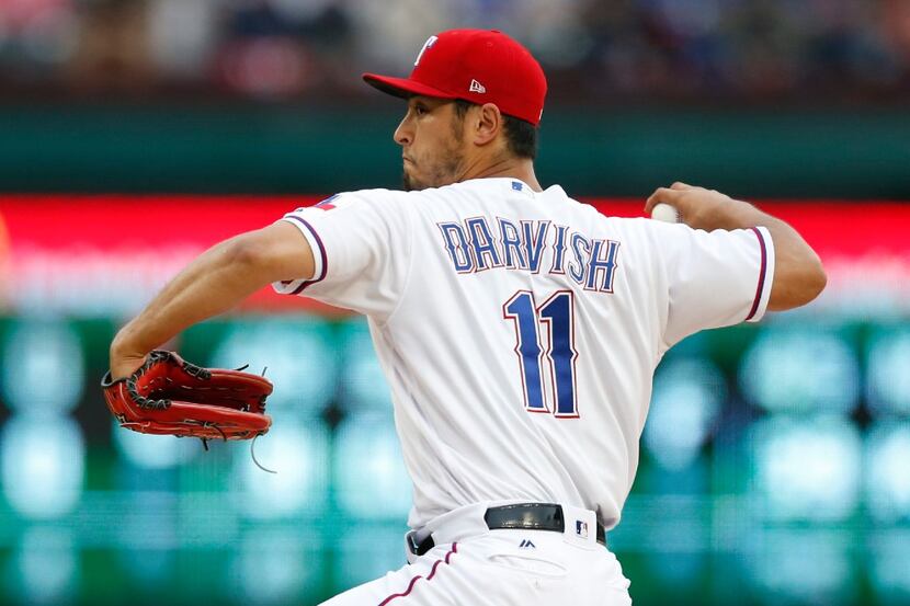 Texas Rangers pitcher Yu Darvish works against the Los Angeles Angels during the second...