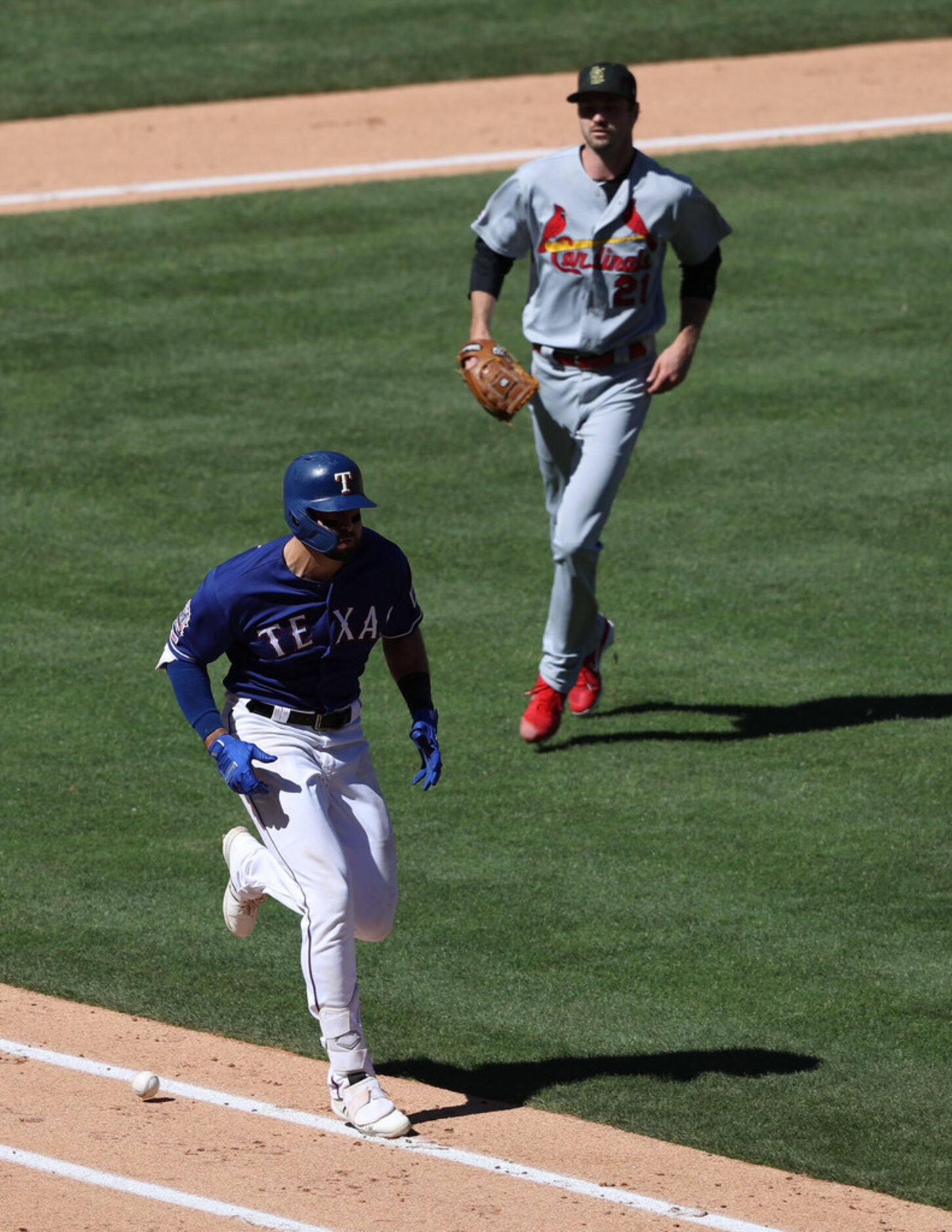 ARLINGTON, TEXAS - MAY 19:  Joey Gallo #13 of the Texas Rangers hits a single against Andrew...