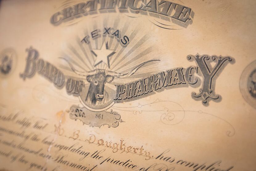 W.B. Dougherty's original state pharmacy certificate hangs in a conference room at the...