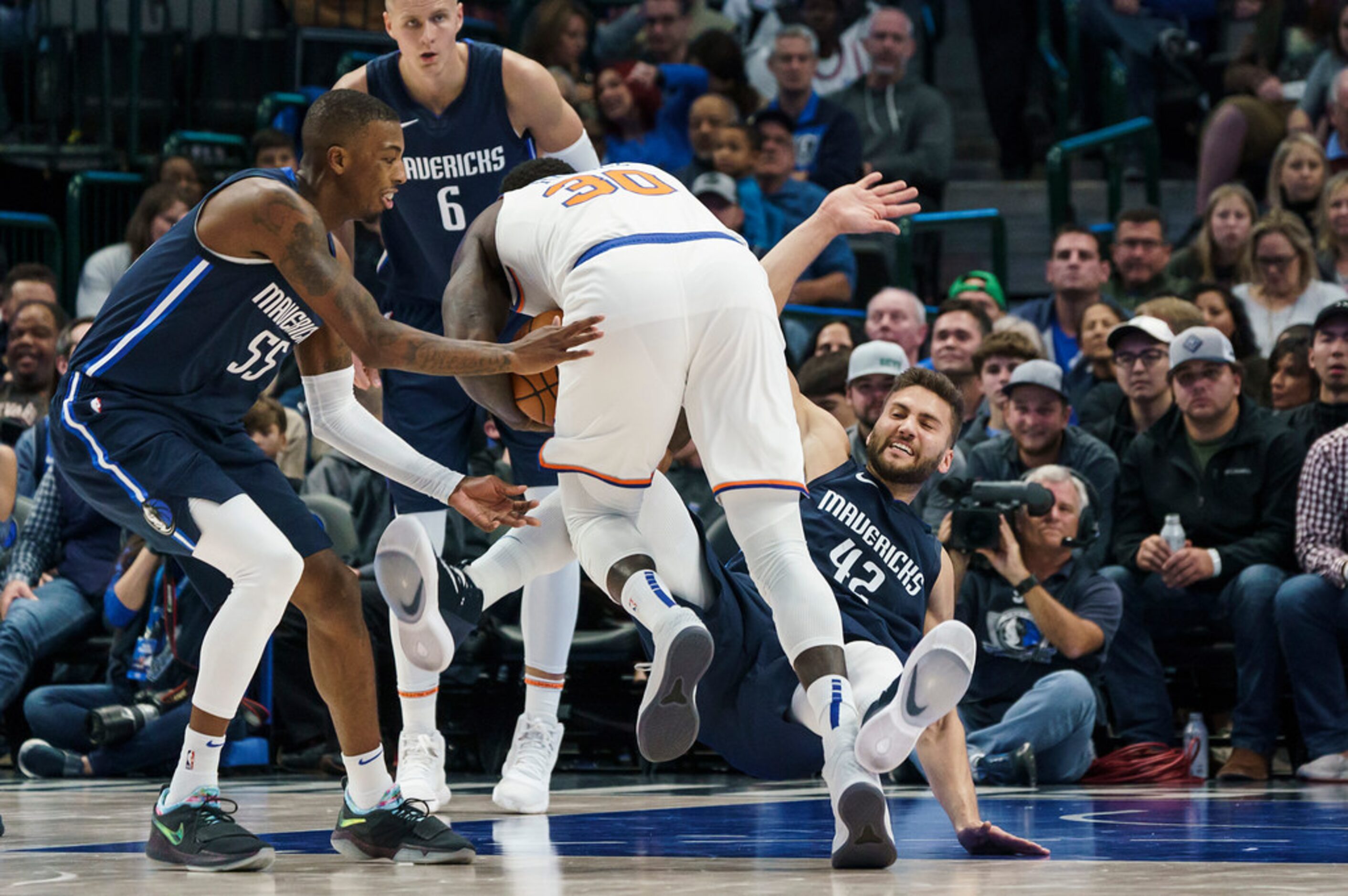 Dallas Mavericks center Maxi Kleber (42) collides with New York Knicks forward Julius Randle...