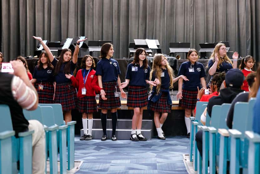 Students perform Christmas music during an open house at Irma Lerma Rangel Young Women's...