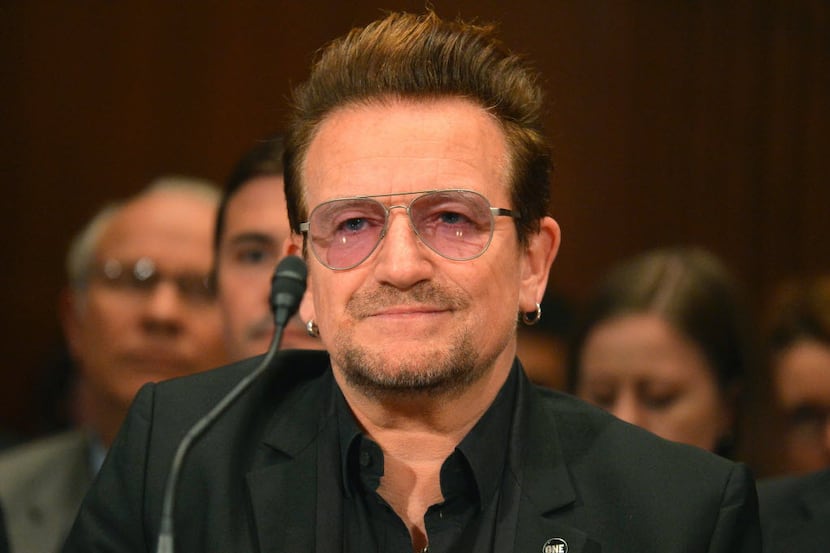 Bono, lead singer of the rock band U2 and humanitarian activist, listened to testimony...