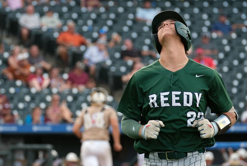 Frisco Reedy Kyle Olson, (22), reacts to striking out against Magnolia West in second inning...