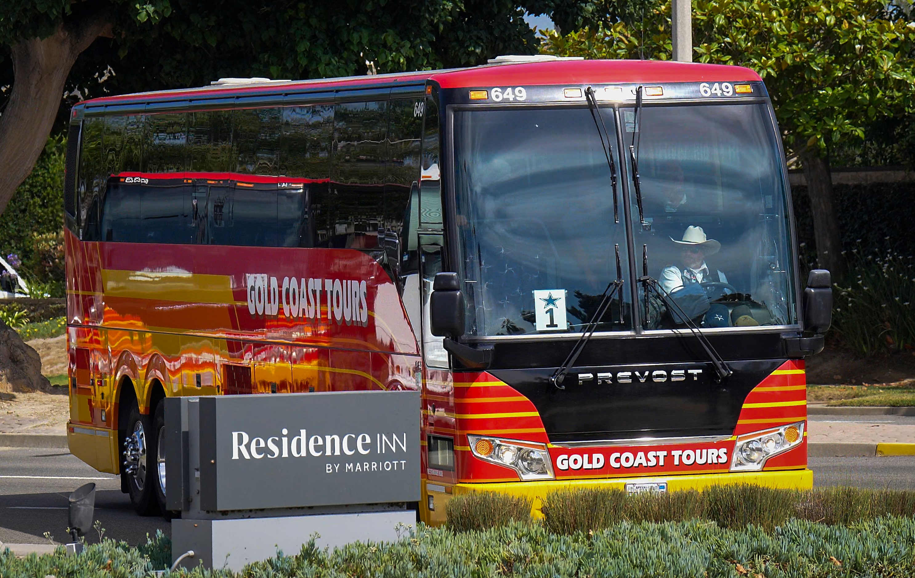 Buses carrying the Dallas Cowboys team and staff arrive for the team’s training camp on...