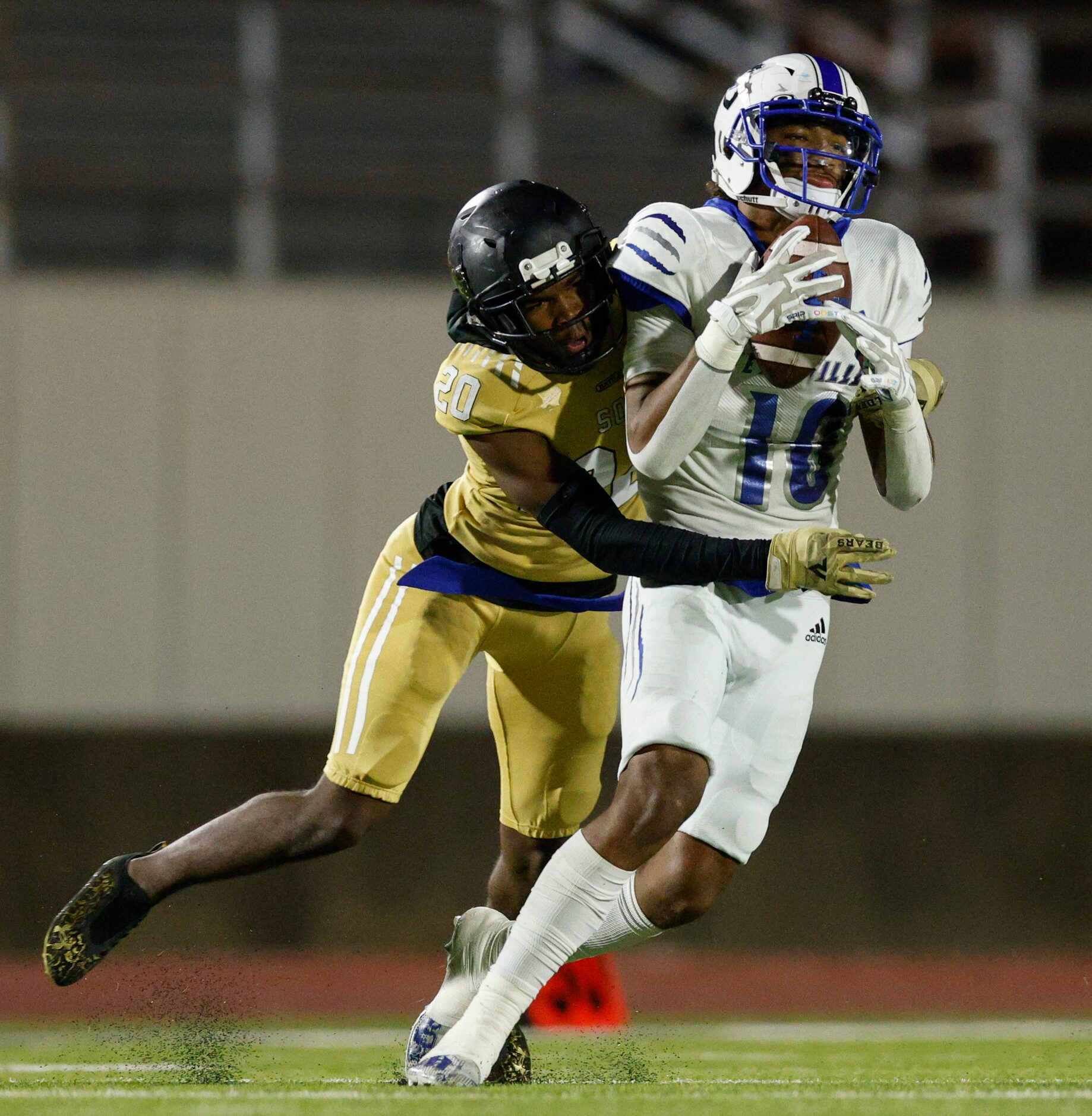 South Oak Cliff defensive back Sultan El-Amin (20) tackles Seagoville wide receiver Brycen...