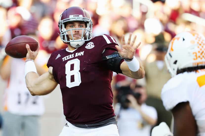 COLLEGE STATION, TX - OCTOBER 08:  Trevor Knight #8 of the Texas A&M Aggies drops back to...