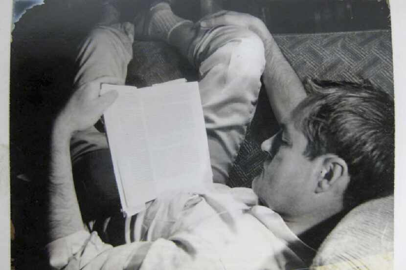 A curled-up Timothy Leary turns his attention to the written word in 1961.