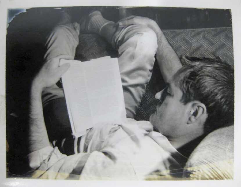 A curled-up Timothy Leary turns his attention to the written word in 1961.