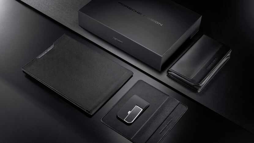 The accessories of the Porsche Designs Acer Book RS TravelPack bundle include a wireless...
