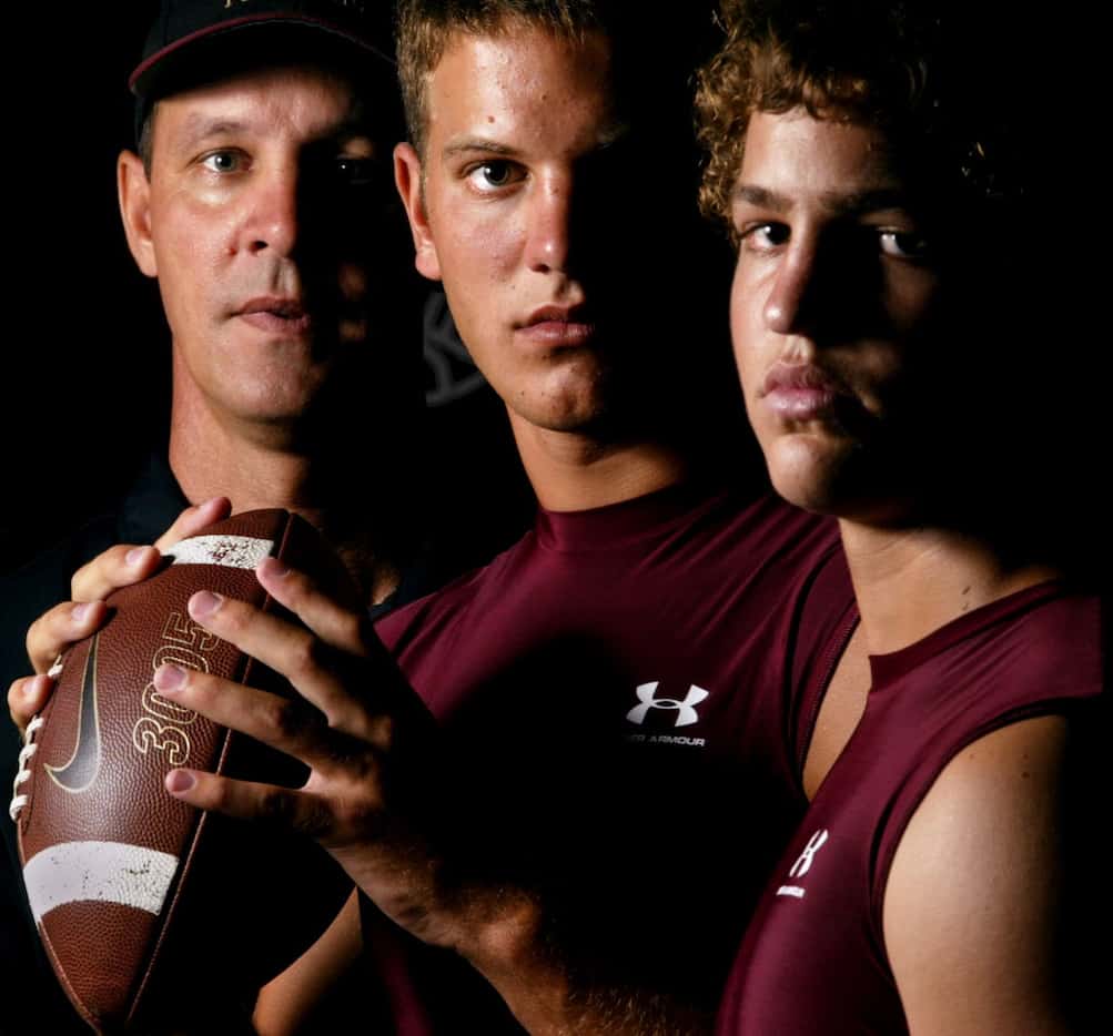 08-01-03 --- (L-R) Coach Sam Harrell poses for a portrait with his two quarterback sons,...