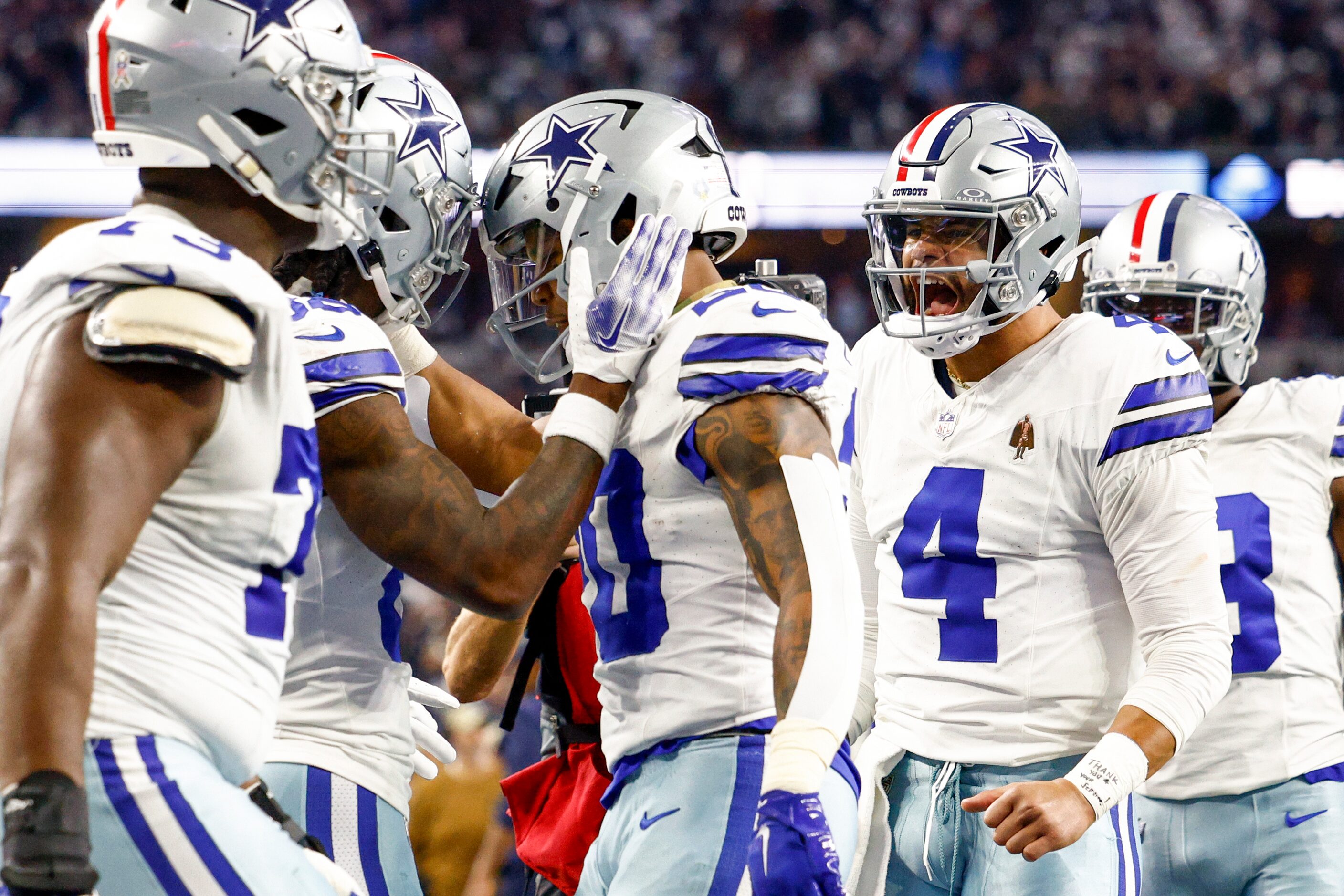 Dallas Cowboys wide receiver CeeDee Lamb (88) celebrates his touchdown with running back...