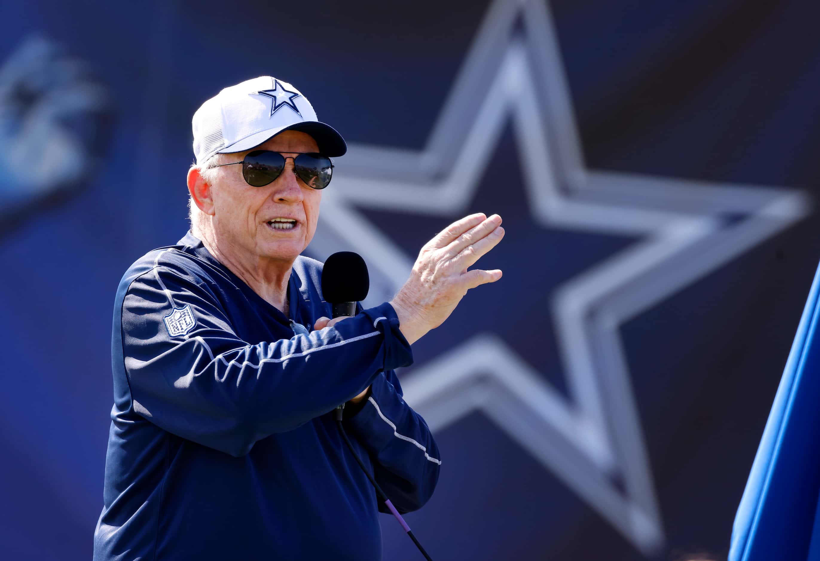 Dallas Cowboys owner Jerry Jones takes part in the annual training camp opening ceremony and...