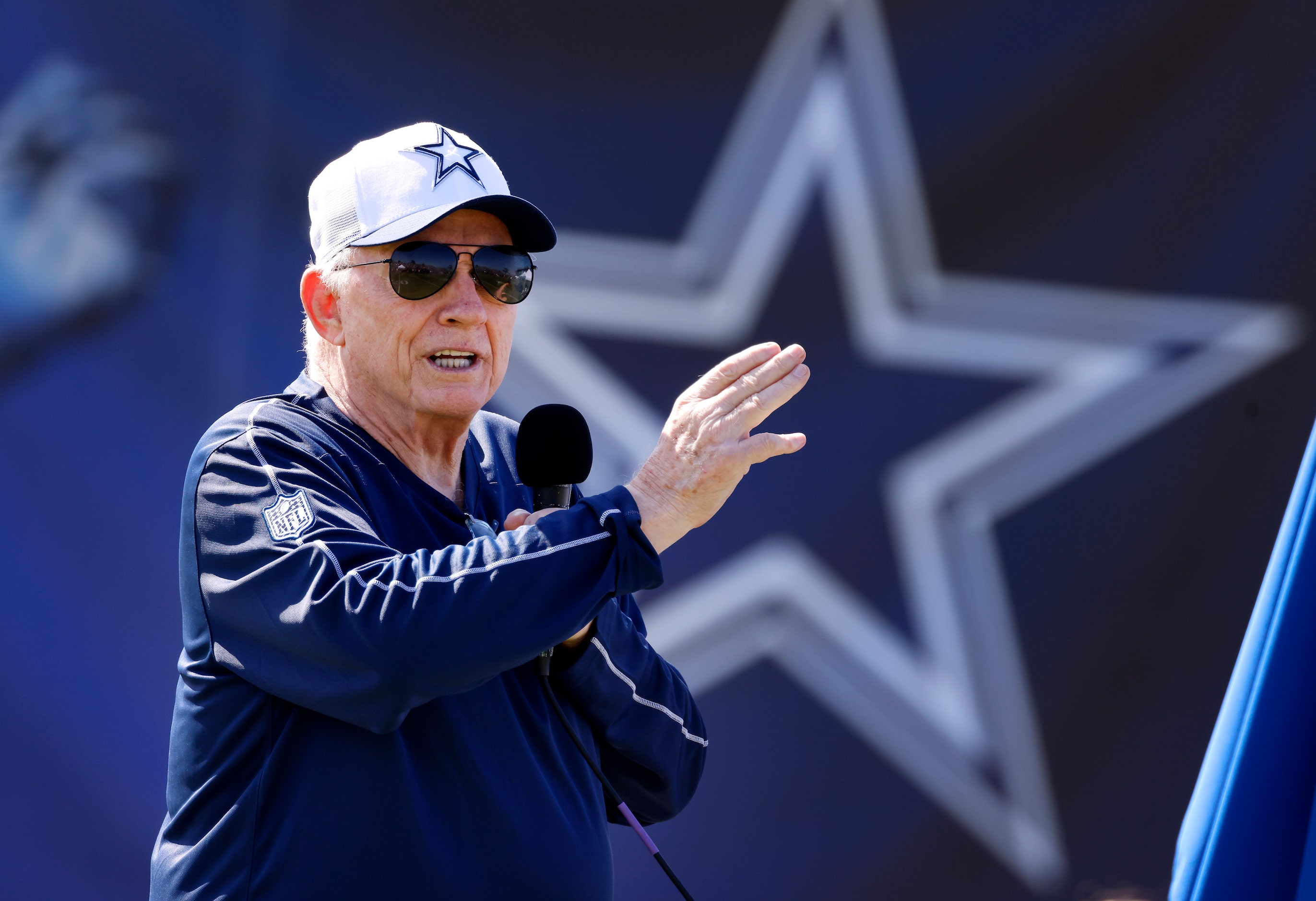 Dallas Cowboys owner Jerry Jones takes part in the annual training camp opening ceremony and...