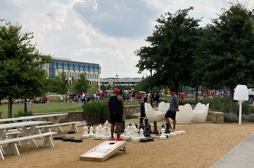 Chess and corn hole games are just some of the attractions at Cypress Waters' Sound district.