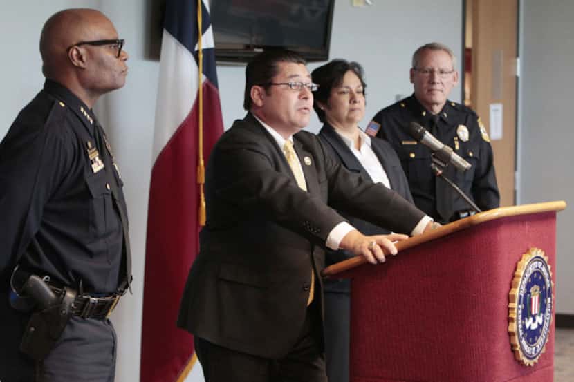 Dallas Police Chief David Brown (left) joined FBI Special Agent in Charge Diego Rodriguez,...