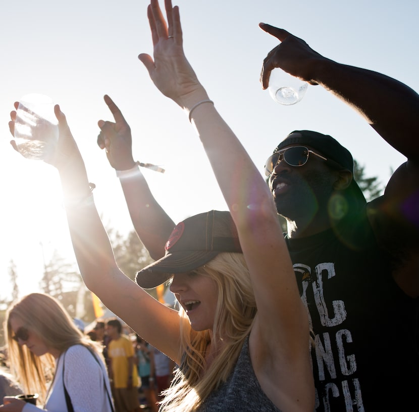 Jason Jackson and Jamie Arnott, of San Francisco, dance together while rap star LL Cool J...