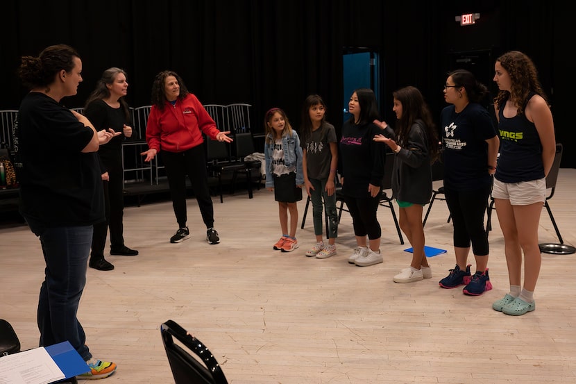 Performers preparing for a show with the North Texas Performing Arts Deaf Theatre in June.