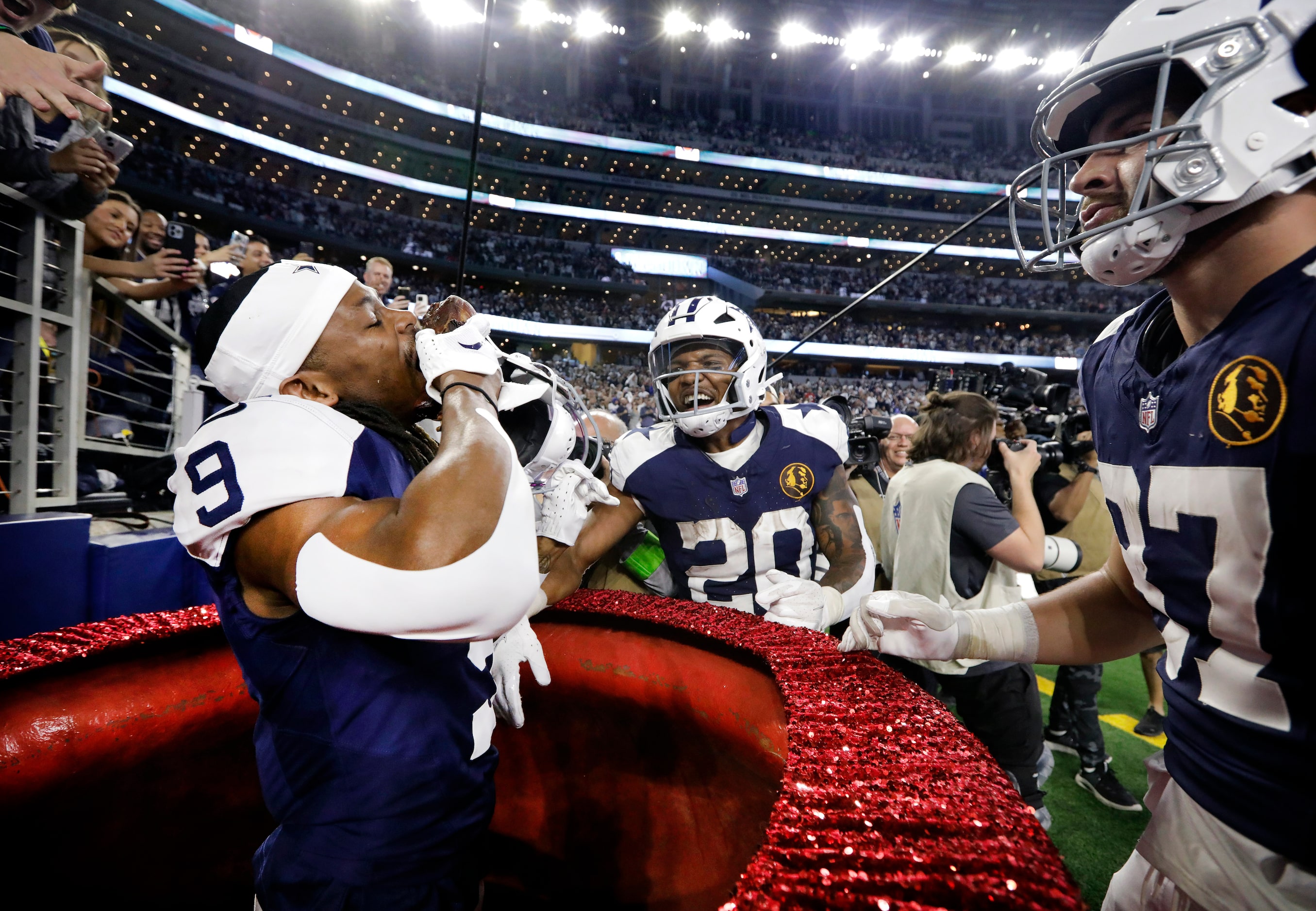 Dallas Cowboys wide receiver KaVontae Turpin (9) feasts on a turkey leg in the Salvation...