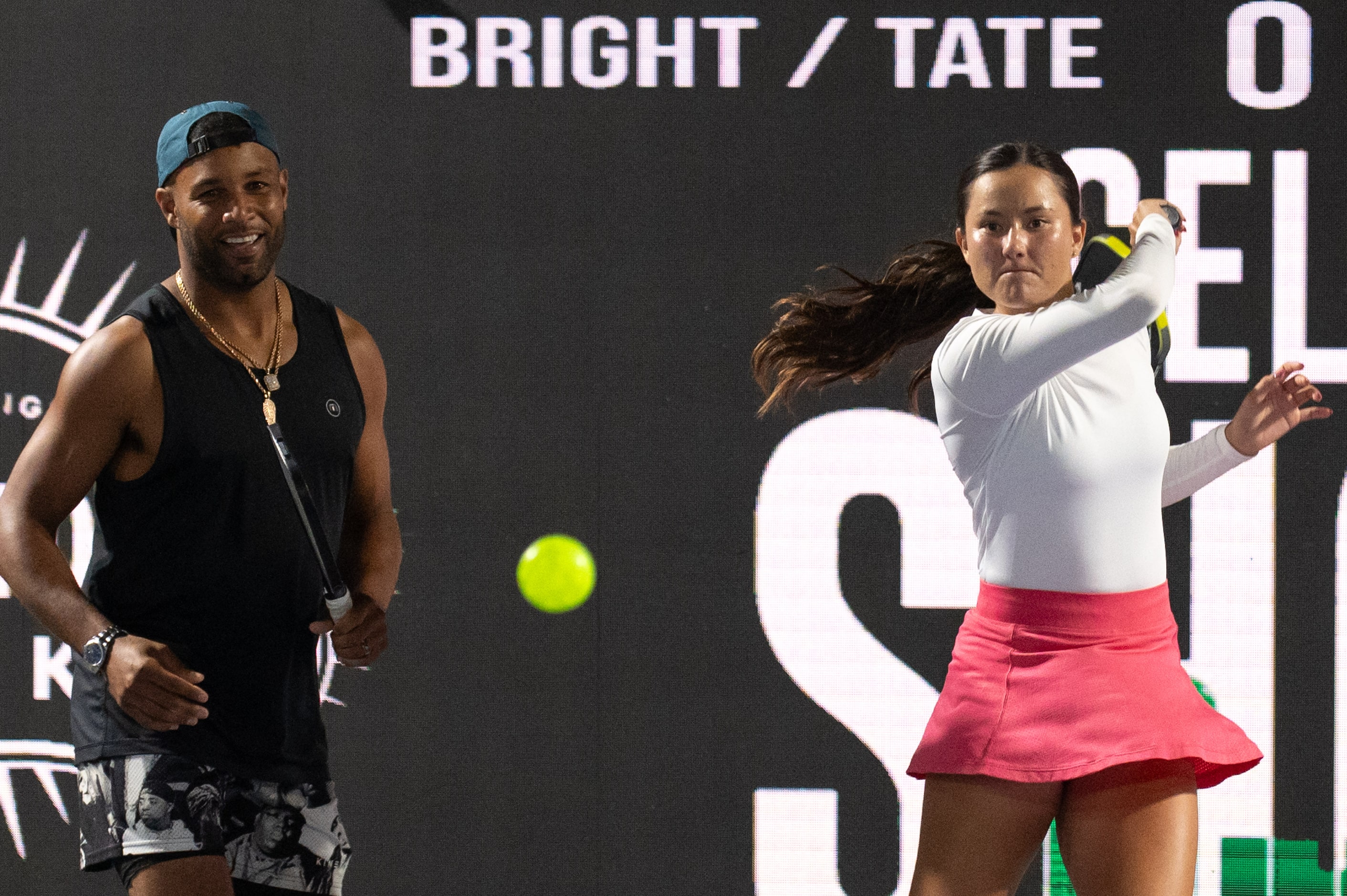 Former NFL wide receiver Golden Tate plays alongside pro pickle ball player Anna Bright...